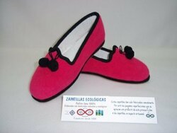 zapatilla b borlas modelo 21  Material de construcción: Fieltro, lana 100% naturales. color fusia liso Tallasde la 33 a la 42